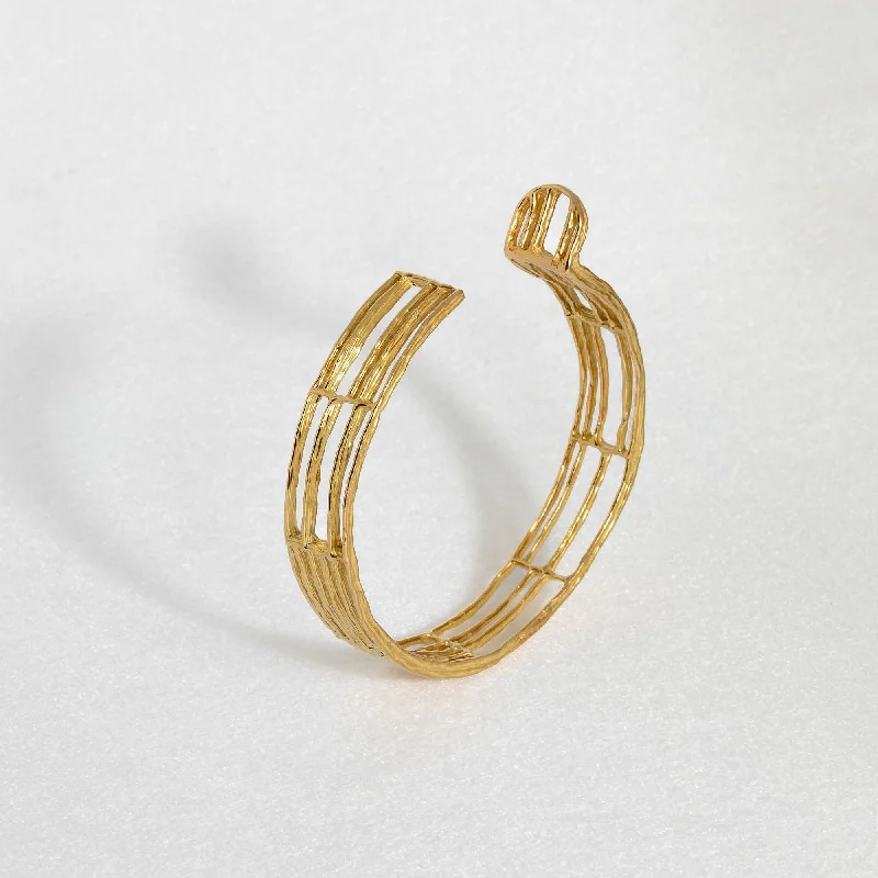 Trendy bracelets with geometric designs-Carole Chiotasso | The Pyrgi Adjustable 18K Gold Bangle