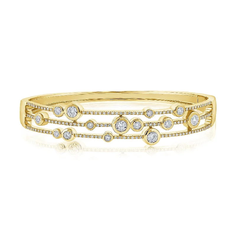 Unique bangles for women with modern designs-Scattered Bezels Triple-Pave Bangle