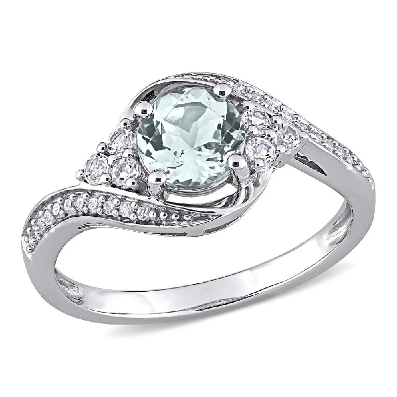 Beautiful engagement rings with emeralds-Miadora 10k White Gold Aquamarine, White Topaz and 1/10ct TDW Diamond Bypass Engagement Ring