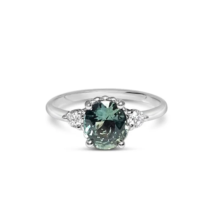 Engagement rings with sapphire stones-DELPHINE || 1.3ct oval green sapphire and diamonds ring